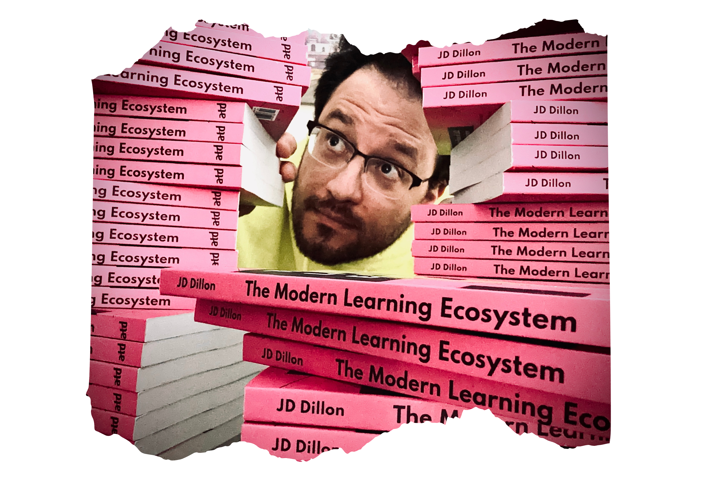 JD surrounded by copies of his book - The Modern Learning Ecosystem
